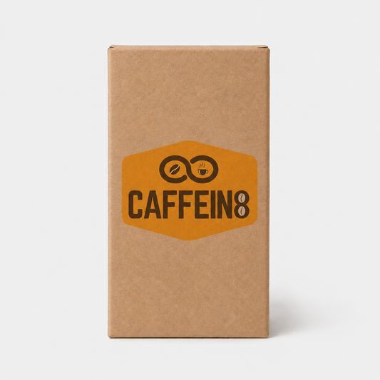 CAFFEIN8 kraft cardboard bag-in-box coffee refill with orange hexagon logo on a plain light background