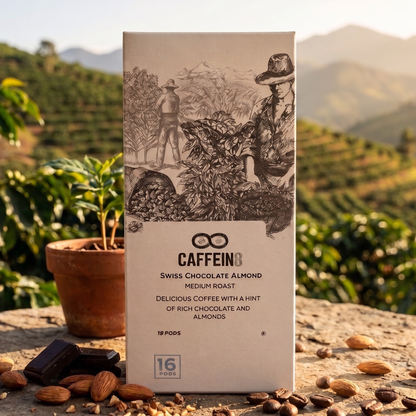 CAFFEIN8 Swiss Chocolate Almond medium roast coffee pods 16 count box on stone with almonds chocolate and coffee plantation in background