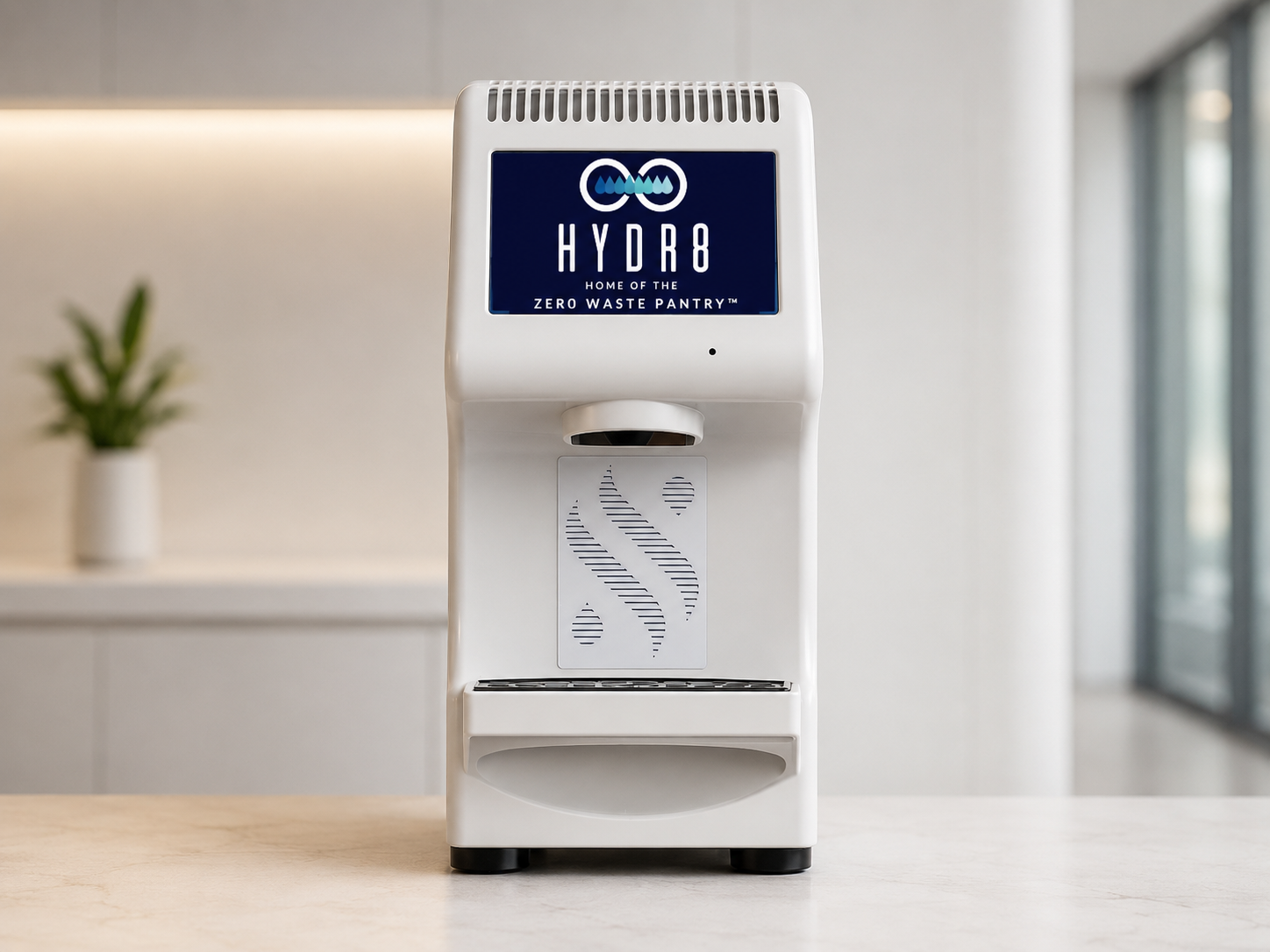 HYDR8 countertop water dispenser with navy touchscreen on a marble counter in a bright modern office break room