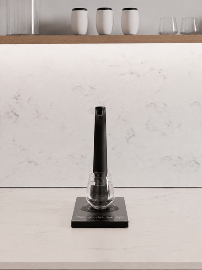 HYDR8 countertop water dispenser with touch controls filling a glass with filtered still water