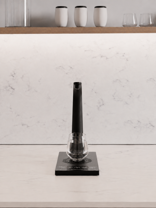 HYDR8 countertop water dispenser with touch controls filling a glass with filtered still water