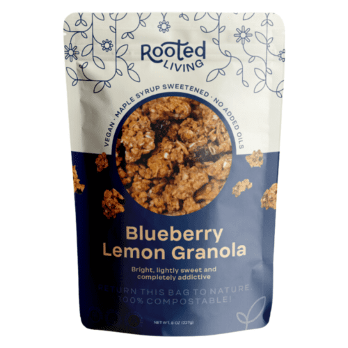 Blueberry Lemon Granola packaging featuring compostable label and crunchy granola made with organic, vegan ingredients bursting with blueberry and lemon flavor.