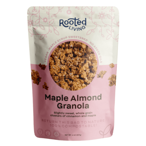 Maple Almond Granola packaging featuring compostable label and clusters of granola made with maple syrup, cinnamon, and vanilla.