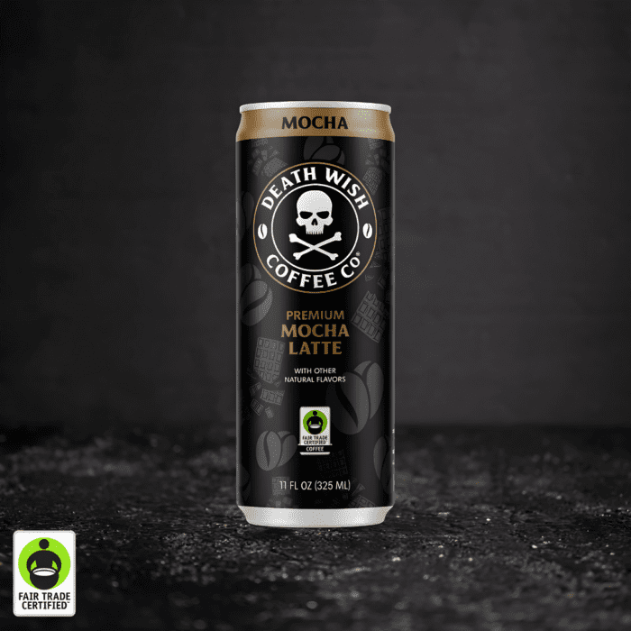 A black 11oz can of Death Wish Coffee® Mocha Latte featuring coffee bean and chocolate bar illustrations, Fair Trade Certified™ badge, and bronze accents.