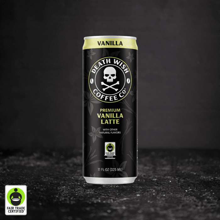 Black 11oz can of Death Wish Coffee® Vanilla Latte featuring vanilla floral illustrations, the skull and crossbones logo, and a Fair Trade Certified™ badge.